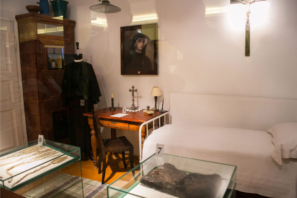 the cell of Saint Faustina, preserved behind glass