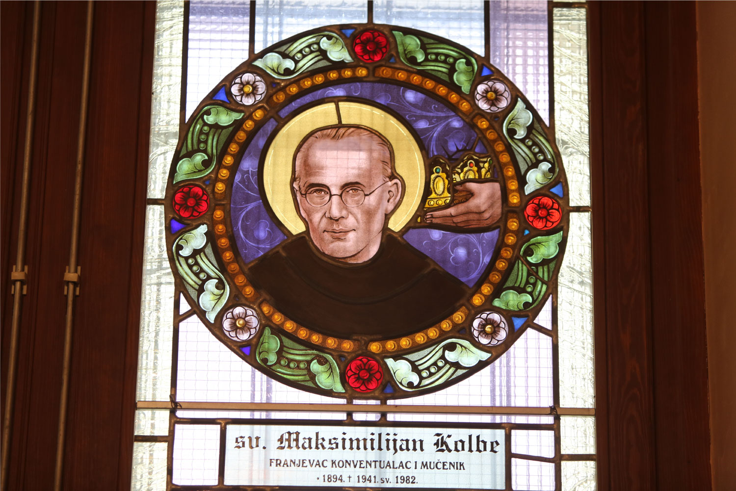 stained glass depicting the image of St Maximilian Kolbe